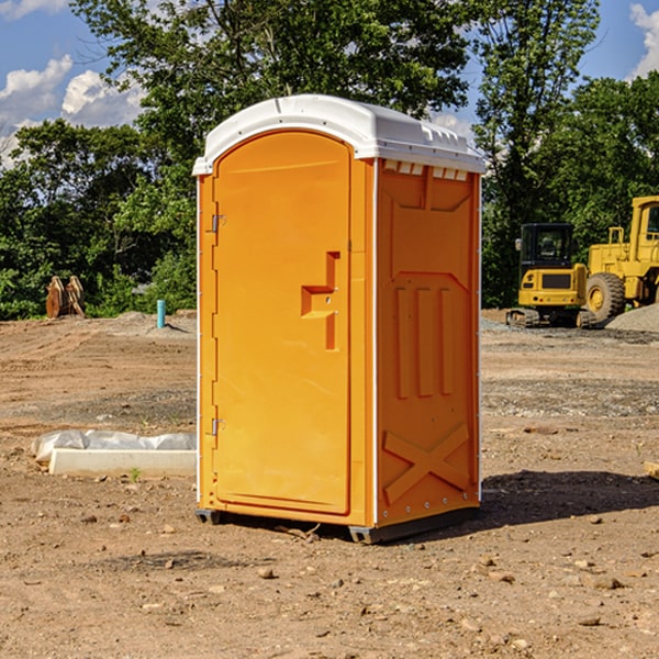 what is the cost difference between standard and deluxe portable restroom rentals in Hadley